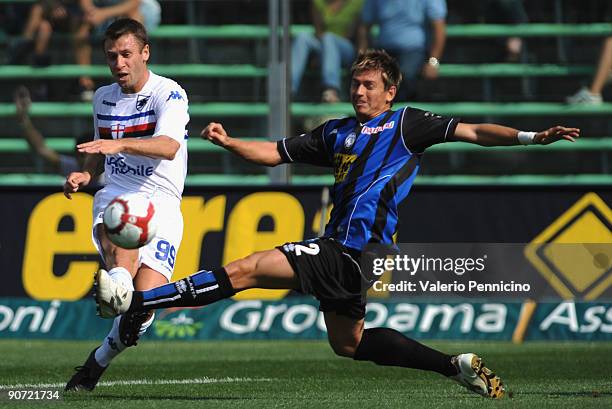 Josue Talamonti of Atalanta BC battles for the ball with Antonio Cassano of UC Sampdoria during the Serie A match between Atalanta BC and UC...