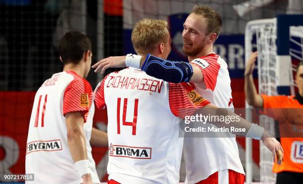 Henrik Toft Hansen of Denmark celebrate with team mate Anders Zachariassen after the Men's Handball European Championship main round match between...