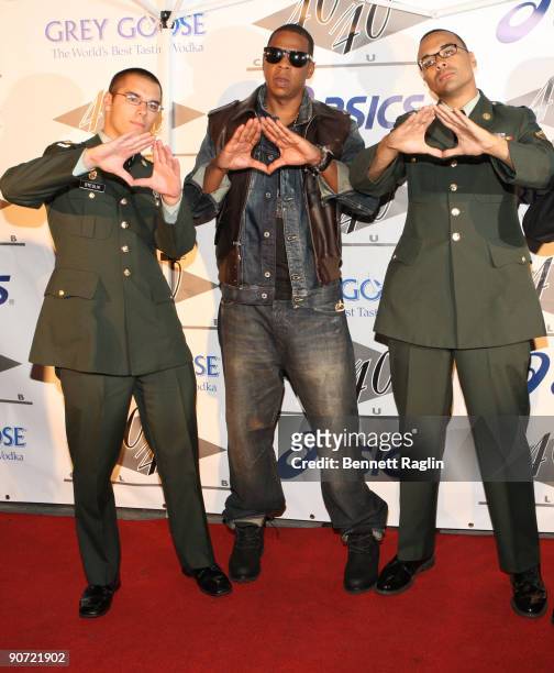 Spec. Tony Sdeglik, Jay-Z and PFC Gregory Williams attend the 2009 MTV Video Music Awards after party at 40 / 40 Club on September 13, 2009 in New...