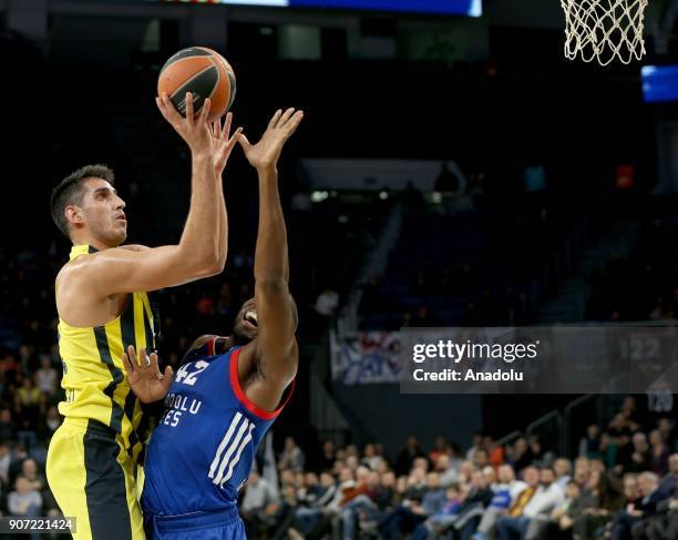 Ahmet Duverioglu of Fenerbahce Dogus in action against Bryant Dunston of Anadolu Efes during a Turkish Airlines Euroleague week 19 basketball match...