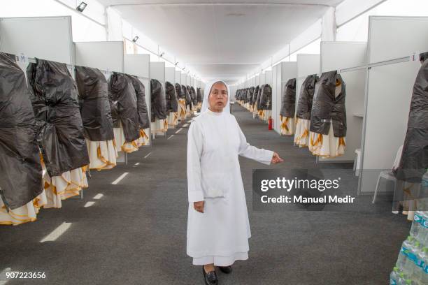 Nun prepares the priestly attires for priests and bishops that will be used in Pope´s mass during Pope Francis 4-day apostolic visit to Peru on...