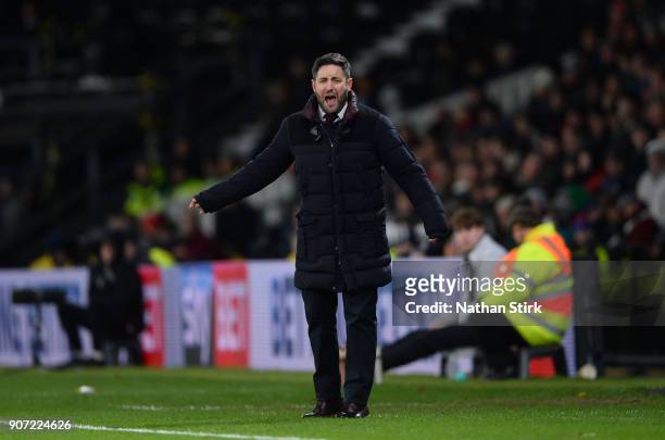 Lee Johnson manager of Bristol City looks on during the Sky Bet Championship match between Derby County and Bristol City at iPro Stadium on January...