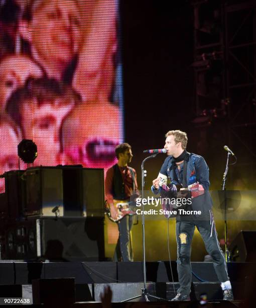 Chris Martin of Coldplay performs on stage at Old Trafford on September 12, 2009 in Manchester, England.