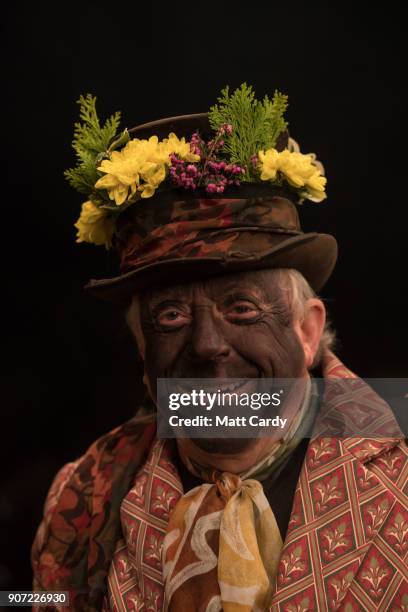 Member of the Leominster Morris poses for a photograph as they prepare to lead the crowd from the Hobson Brewery in Frith Common to the nearby apple...