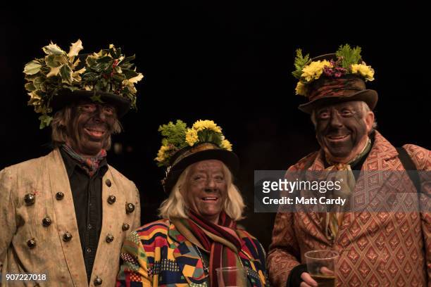 Some of the members of the Leominster Morris pose for a photograph as they prepare to lead the crowd from the Hobson Brewery in Frith Common to the...