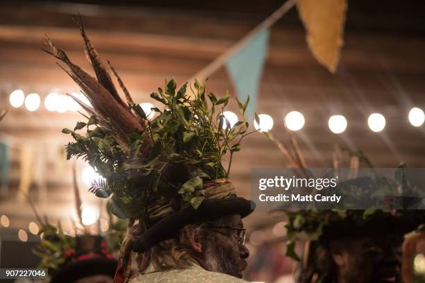 Members of the Leominster Morris prepare to lead the crowd from the Hobson Brewery in Frith Common to the nearby apple orchard to take part in a...