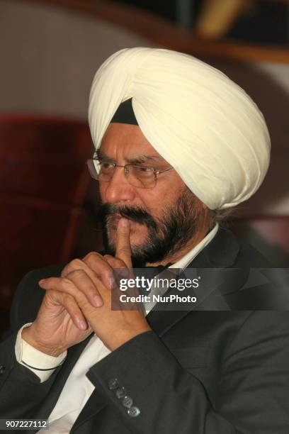 Sikh man watches intently as contestants compete in the Giddha folk dance segment during the Miss World Punjaban beauty pageant held in Mississauga,...