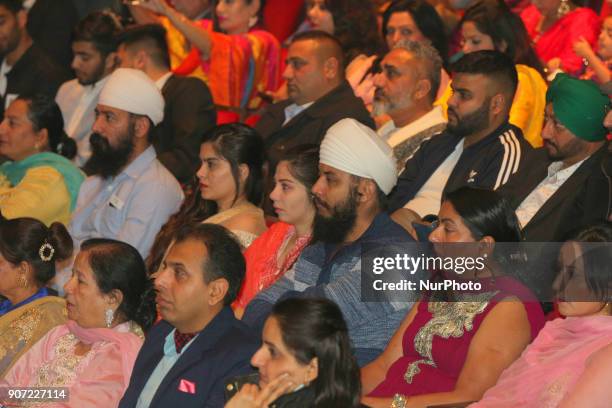 Audience watches as contestants compete in the Giddha folk dance segment during the Miss World Punjaban beauty pageant held in Mississauga, Ontario,...