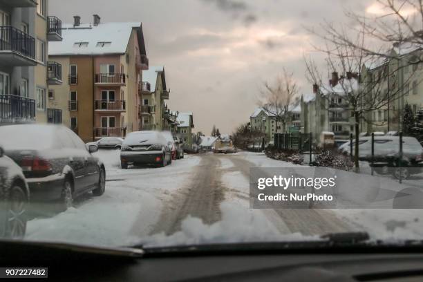 Local road covered by snow is seen in Gdansk, Poland on 19 January 2018 Heavy snow fall and wind Power has been cut to some 30,000 Polish homes after...