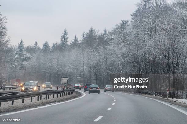 Cars in the winter scenery of the Tricity Ringroad are seen in Gdansk, Poland on 19 January 2018 Heavy snow fall and wind Power has been cut to some...