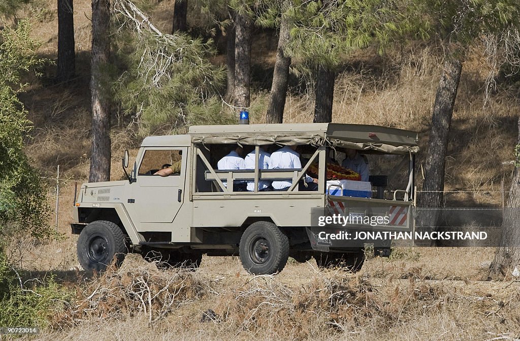 Assaf Ramon Crash The coffin of late Israeli Air Force pilot Assaf Ramon is transported ...
