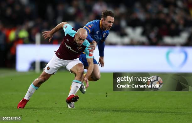 Pablo Zabaleta of West Ham United and Alex Rodman of Shrewsbury Town during the Emirates FA Cup Third Round Replay match between West Ham United and...