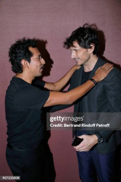 Stylist of Berluti men, Haider Ackermann and model Andres Velencoso pose after the Berluti Menswear Fall/Winter 2018-2019 show as part of Paris...