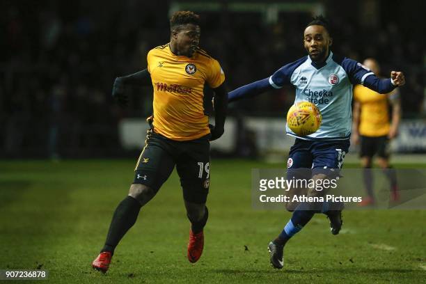Tyler Reid of Newport County is challenged by Cedric Evina of Crawley Town during the Sky Bet League Two match between Newport County and Crawley...
