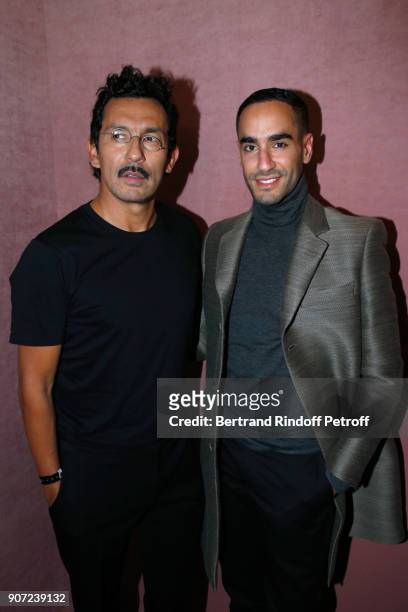Stylist of Berluti men, Haider Ackermann and guest pose after the Berluti Menswear Fall/Winter 2018-2019 show as part of Paris Fashion Week on...