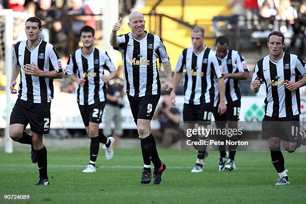 Lee Hughes of Notts County celebrates after scoring his third and his sides fifth goal during the Coca Cola League Two match between Notts County and...