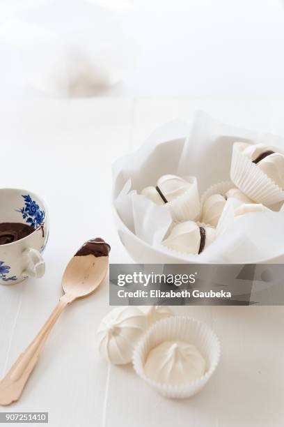 meringues kisses cookies with dark chocolate ganache - maräng bildbanksfoton och bilder