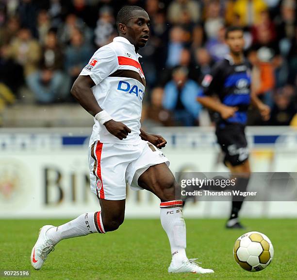 Charles Takyi of St. Pauli runs with the ball during the 2.Bundesliga match between FSV Frankfurt and FC St. Pauli at the Volksbank stadium on...