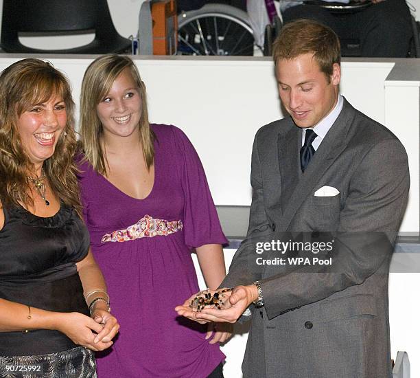 Prince William is handed a tarantula by Jan Beccaloni during a visit to open The New Darwin Centre at The Natural History Museum on September 14,...