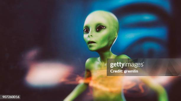 alien on the run - alien stock pictures, royalty-free photos & images