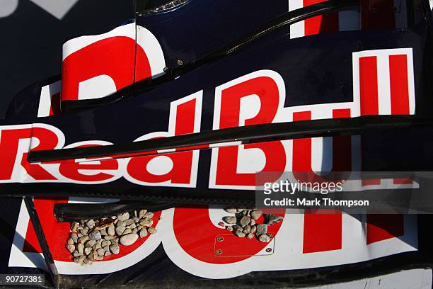 The car of Mark Webber of Australia and Red Bull Racing ends up in the gravel during the Italian Formula One Grand Prix at the Autodromo Nazionale di...