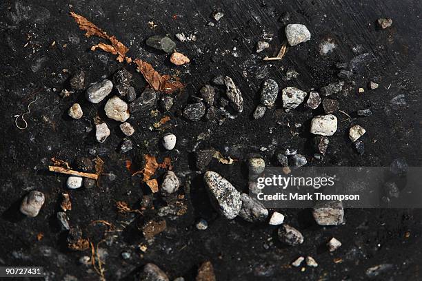 The car of Mark Webber of Australia and Red Bull Racing ends up in the gravel during the Italian Formula One Grand Prix at the Autodromo Nazionale di...