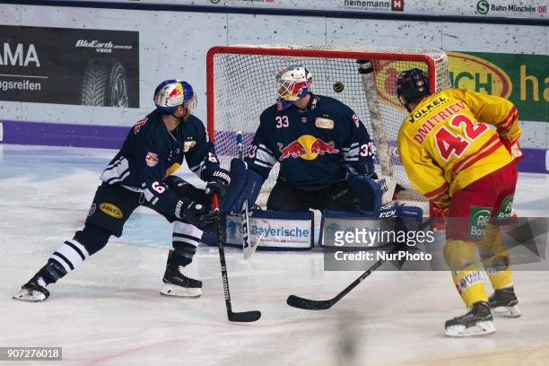 Alexei Dmitriev of Duesseldorfer EG scores during the 43th game day of the German Ice Hockey League between Red Bull Munich and Duesseldorfer EG at...