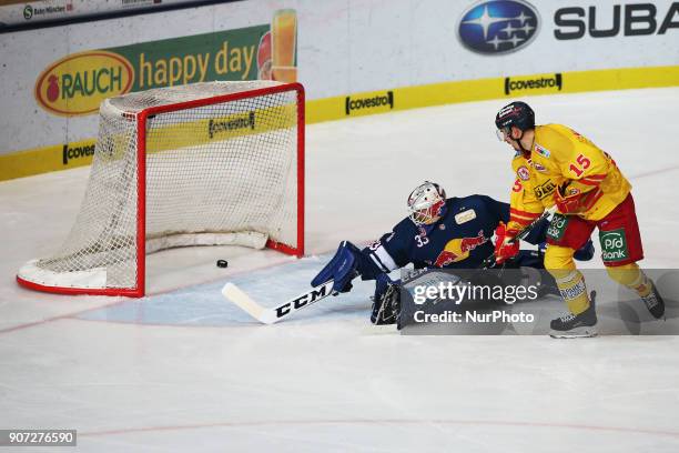 Spencer Machacek of Duesseldorfer EG scores during the 43th game day of the German Ice Hockey League between Red Bull Munich and Duesseldorfer EG at...