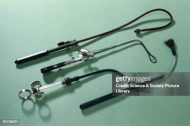 Syringe, throat brush, bougie and ecraseur. The throat brush, bougie and ecraseur probably all belonged to the eminent surgeon, Sir Morell MacKenzie...