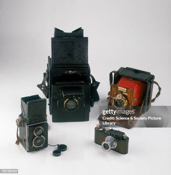 This selection of cameras illustrates the variety of different types of camera available to the photographer by the 1920s. Clockwise from left:...