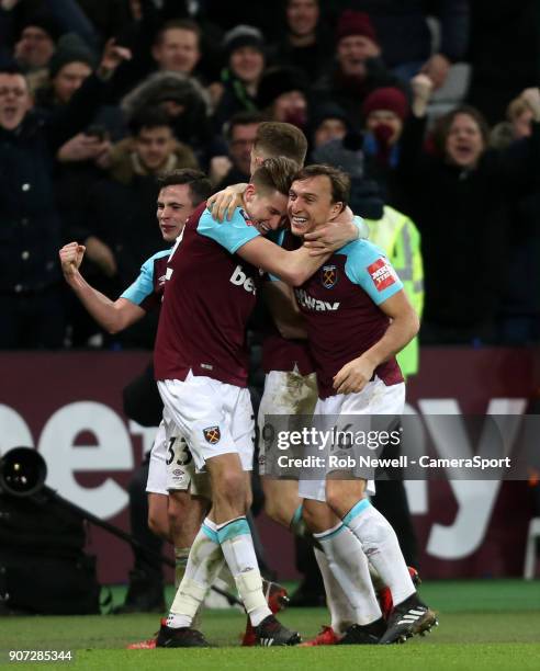 West Ham United's Reece Burke is conratulated by Mark Noble after scoring his side's winning goal during The Emirates FA Cup Third Round Replay match...