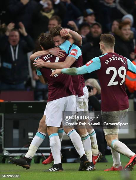 West Ham United's Reece Burke is conratulated by Mark Noble after scoring his side's winning goal during The Emirates FA Cup Third Round Replay match...