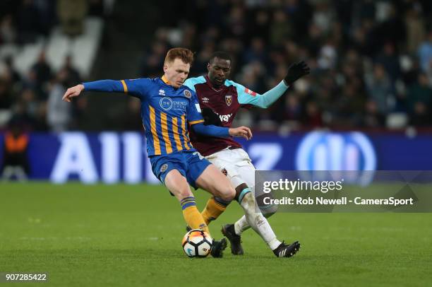 Shrewsbury Town's Jon Nolan and West Ham United's Pedro Obiang during The Emirates FA Cup Third Round Replay match between West Ham United and...