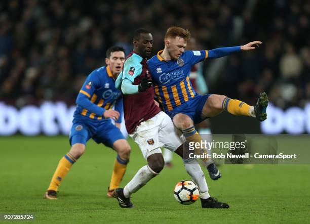 Shrewsbury Town's Jon Nolan and West Ham United's Pedro Obiang during The Emirates FA Cup Third Round Replay match between West Ham United and...