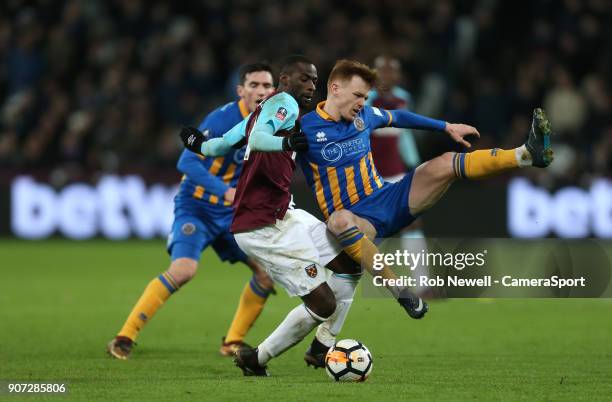 Shrewsbury Town's Jon Nolan and West Ham United's Pedro Obiang during The Emirates FA Cup Third Round Replay match between West Ham United and...