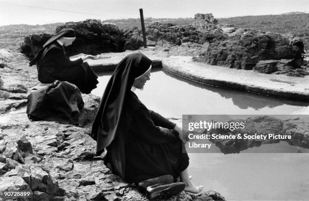 Taken at Weston-Super-Mare in Somerset. Photographer Tony Ray-Jones created most of his images of the British at work and leisure between 1966 and...