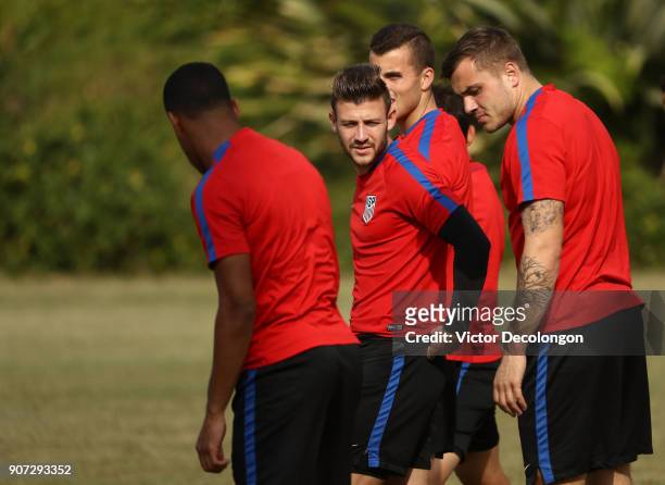 Paul Arriola, second from left, and U.S. Men's National Soccer Team teammates Jordan Morris, far right, and Brooks Lennon look on during training at...