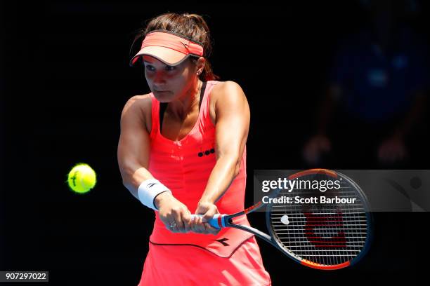 Lauren Davis of the United States plays a backhand in her third round match against Simona Halep of Romania on day six of the 2018 Australian Open at...