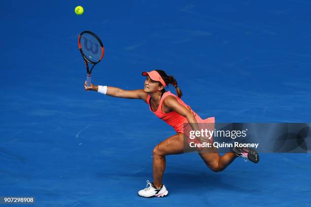 Lauren Davis of the United States plays a forehand in her third round match against Simona Halep of Romania on day six of the 2018 Australian Open at...