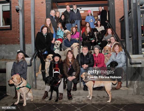 Puppy parade' of local guide dogs for the blind 'puppies-in-training' walk up Main Street and pose for a photo at the Slamdance Film Festival...