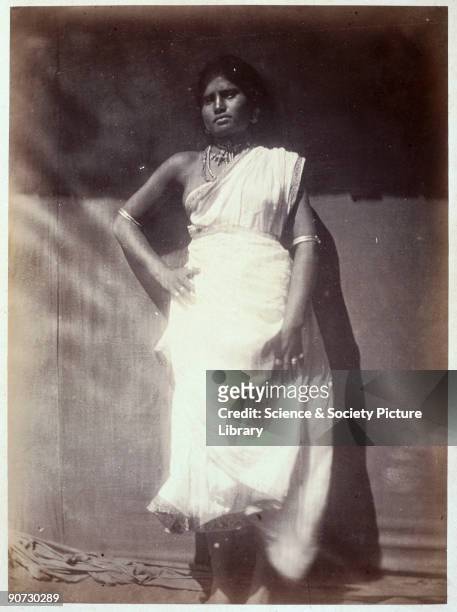 Full length portrait of a woman from Ceylon by Julia Margaret Cameron . Cameron's photographic portraits are considered among the finest in the early...