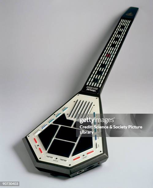 Although shaped like a guitar, this musical instrument has no strings and doesn't make a sound unless it is connected to a computer, using the MIDI...