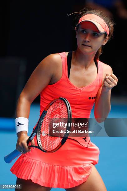 Lauren Davis of the United States celebrates winning a point in her third round match against Simona Halep of Romania on day six of the 2018...