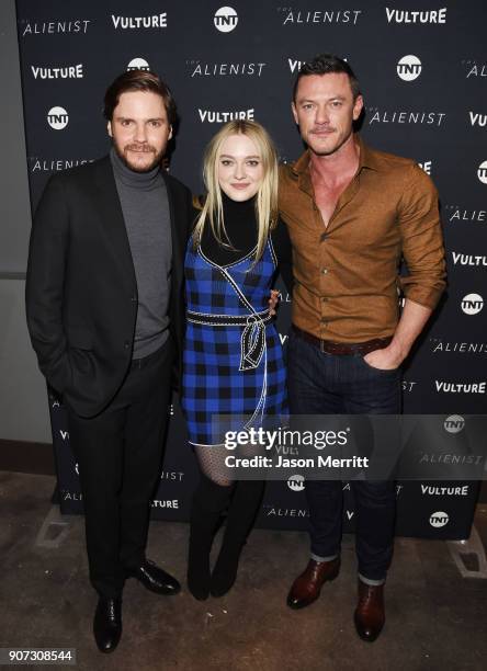 Actors Daniel Bruhl, Dakota Fanning, and Luke Evans attend "The Alienist" Special Screening during Sundance Film Festival 2018 at The Vulture Spot on...