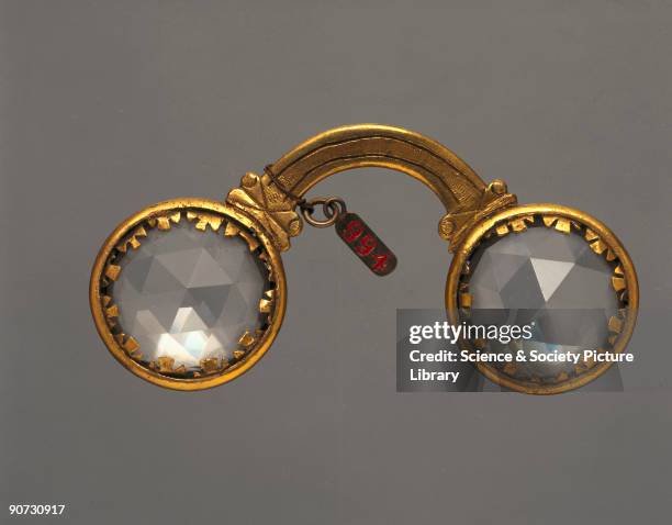 Multiplying spectacles comprising a pair of rock crystal 'lenses', each with 24 facets, in a gilt metal frame. Spectacles have been in use in the...