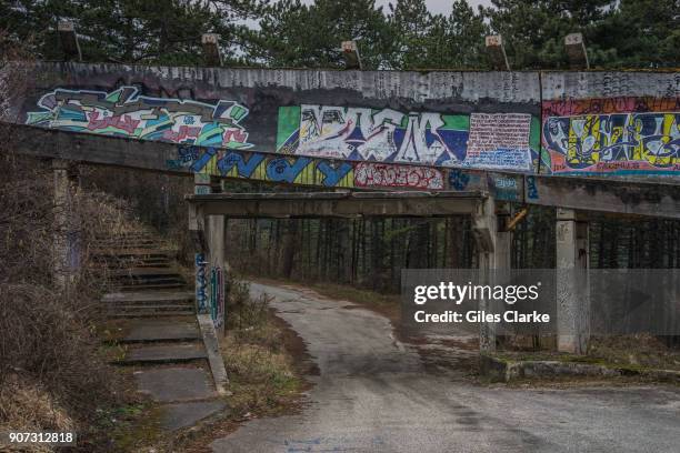 The 1984 Sarajevo bobsled run on Mount Trebević as it is now. The three-kilometer-long run winds its way down through the woods to a bombed-out...