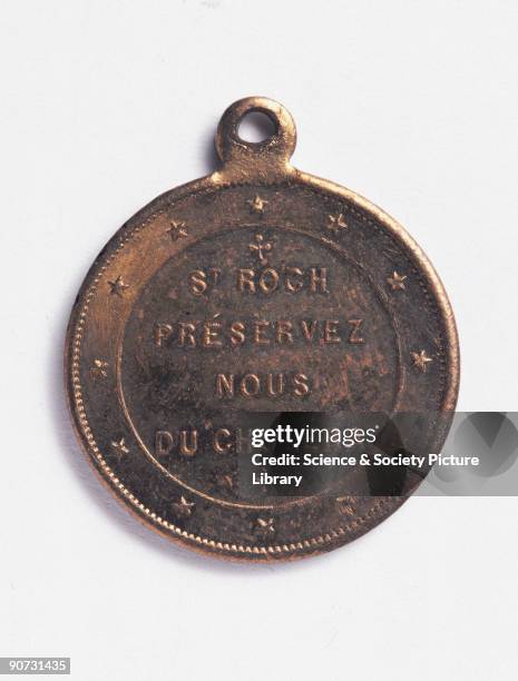 This amulet is inscribed on the reverse with the words �St Roch preservez nous du cholera� . St Roch was often invoked against the Plague and other...