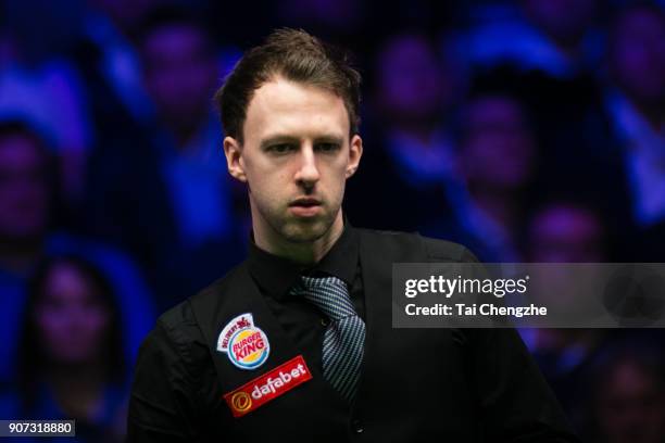 Judd Trump of England reacts during his quarter-final match against Shaun Murphy of England on day six of The Dafabet Masters at Alexandra Palace on...