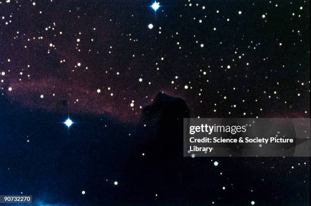 Photograph of the Horsehead Nebula, just discernible as a dark shadow in the centre of the picture. Also known as Barnard 33, the Horsehead Nebula is...