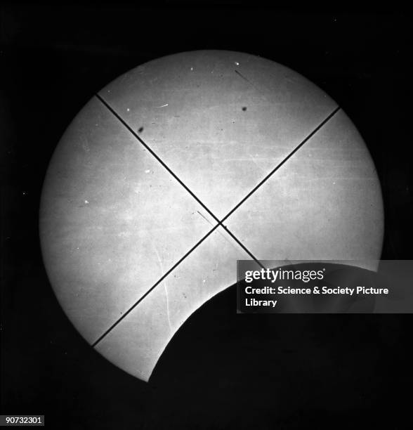 Photographic glass slide, taken during the 1860 Solar Eclipse, showing the Sun partly obscured by the Moon. The picture taken by Warren De La Rue , a...